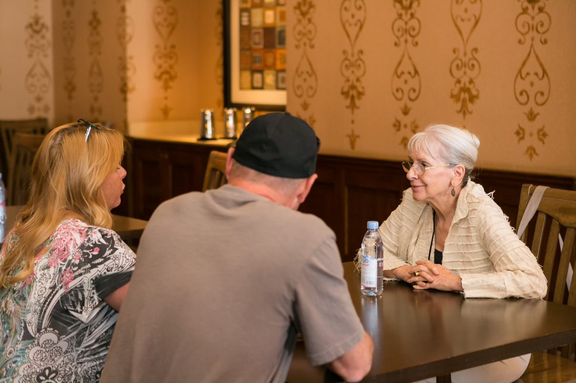 people talking at table