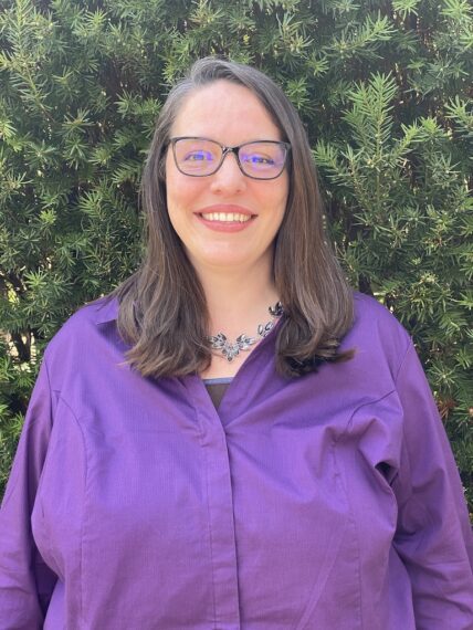 women in purple shirt