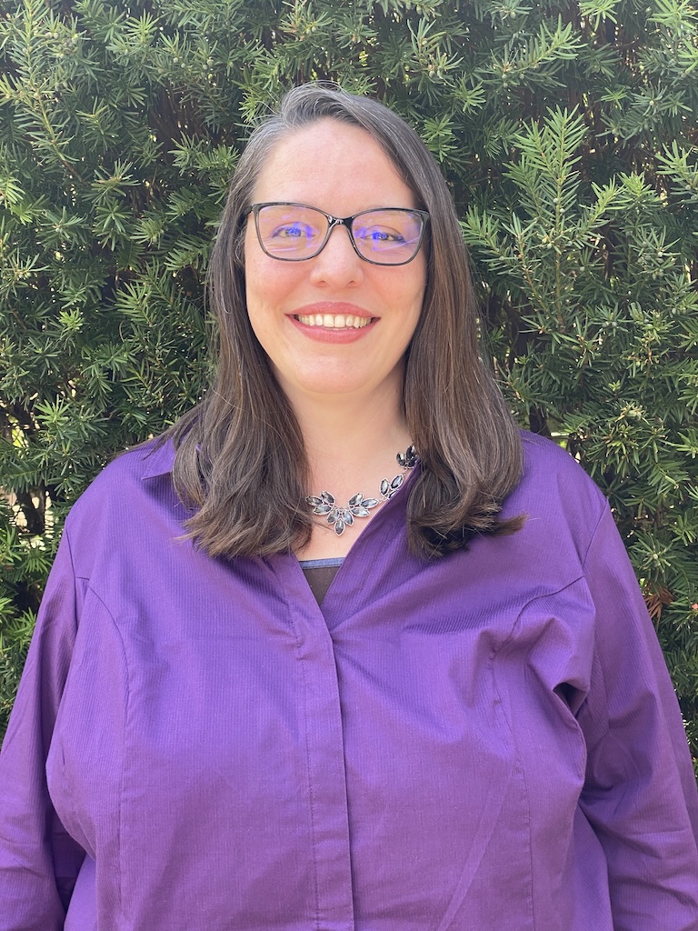 women in purple shirt