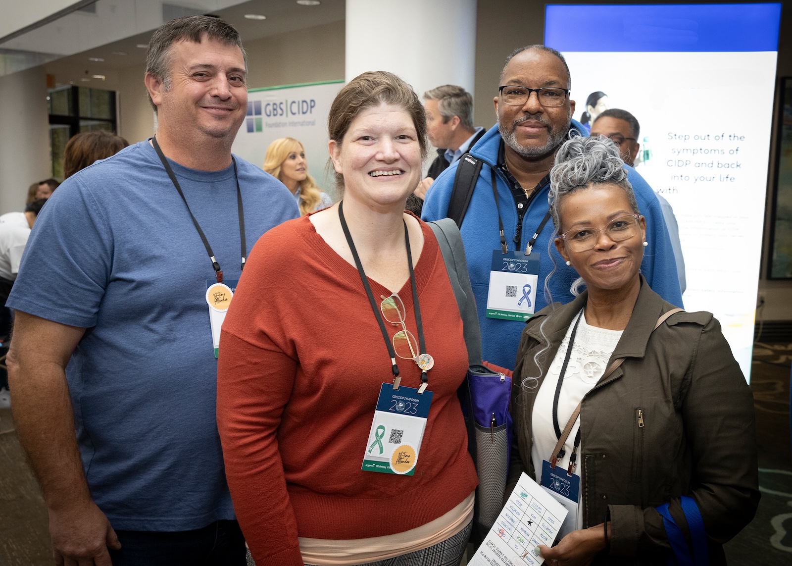 Four attendees at a GBS-CIDP conference